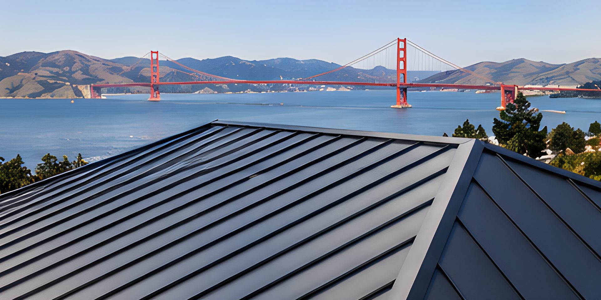 Standing-seam metal roof in the foreground, the Golden Gate Bridge and the Marin hills across the water.